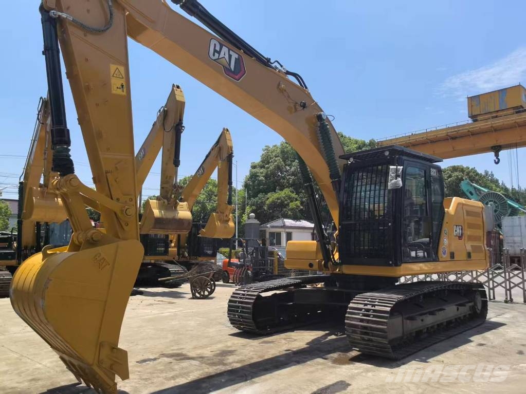 CAT 323 Vikšriniai ekskavatoriai
