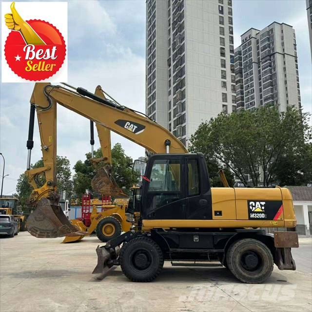 CAT M 320 Bagri na kolesih