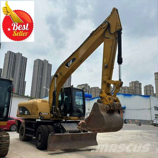 CAT M 320 Bagri na kolesih