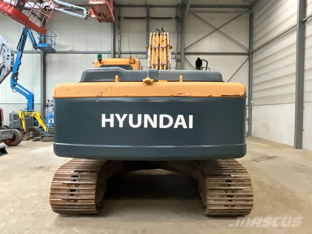 Hyundai Robex 210 LC-9 Гусеничні екскаватори