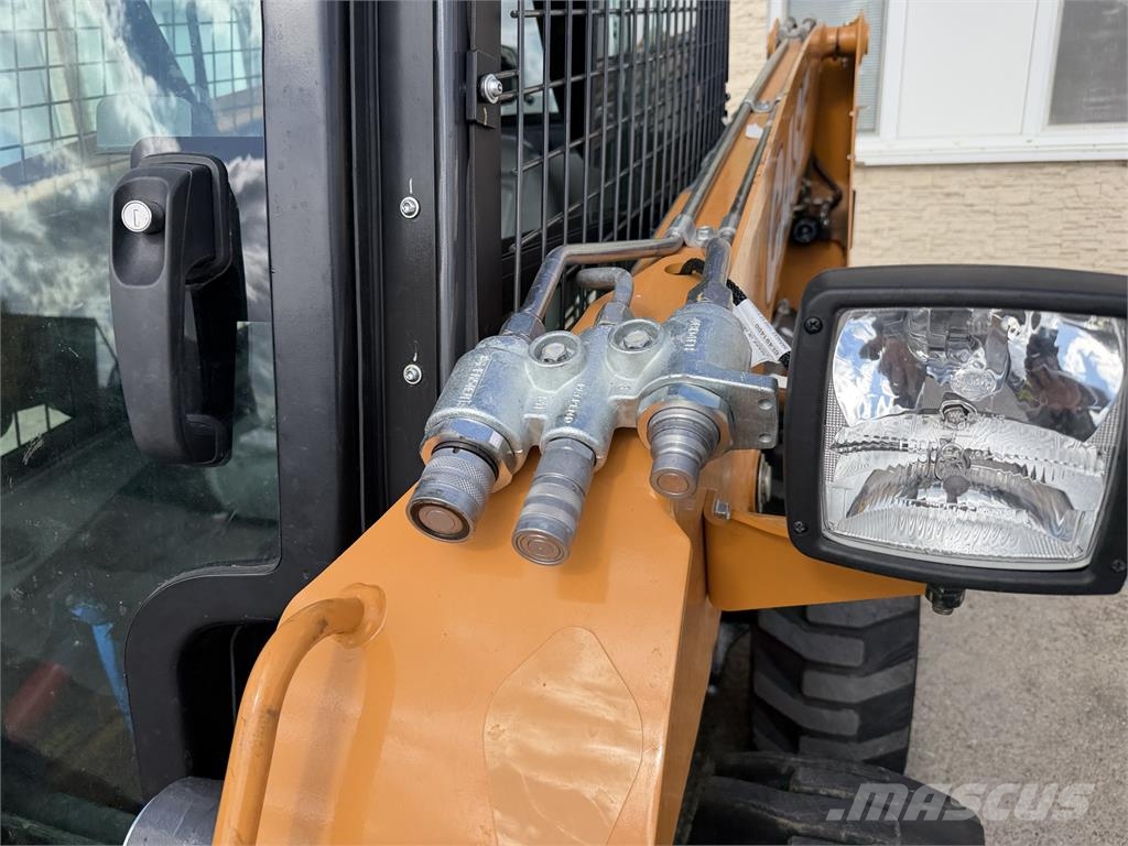 CASE Iný model VIN 818 لوادر انزلاقية التوجيه