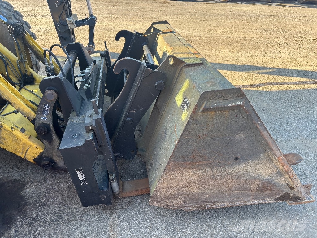 New Holland LB 115 B-4 PS / Kallistaja, 2 kauhaa, Hyd-piikit Rendegravere