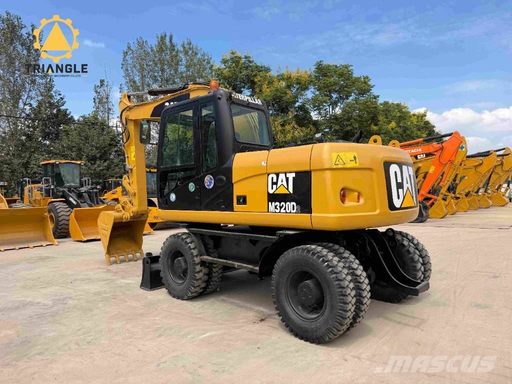 CAT M 320 D Wheeled excavators