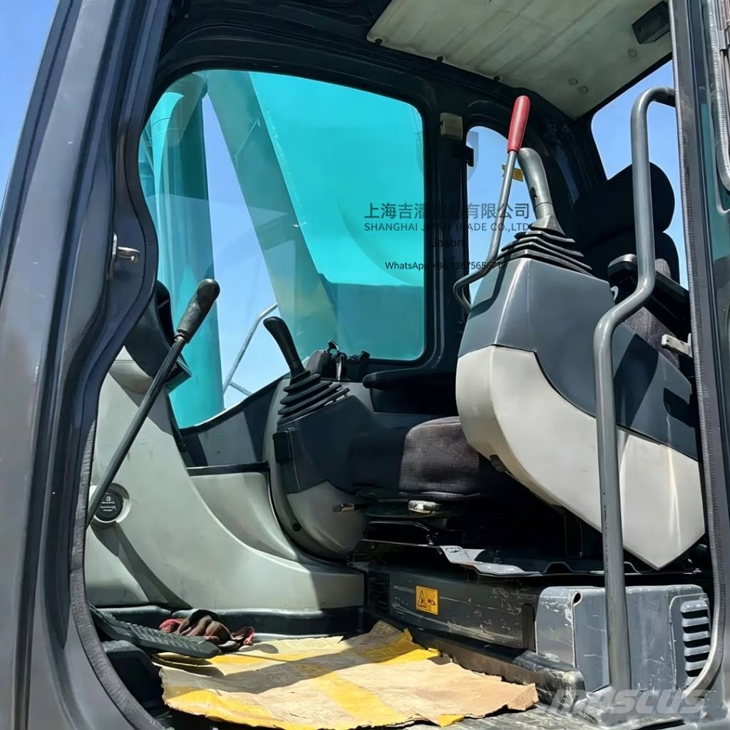 Kobelco SK 210 Гусеничні екскаватори