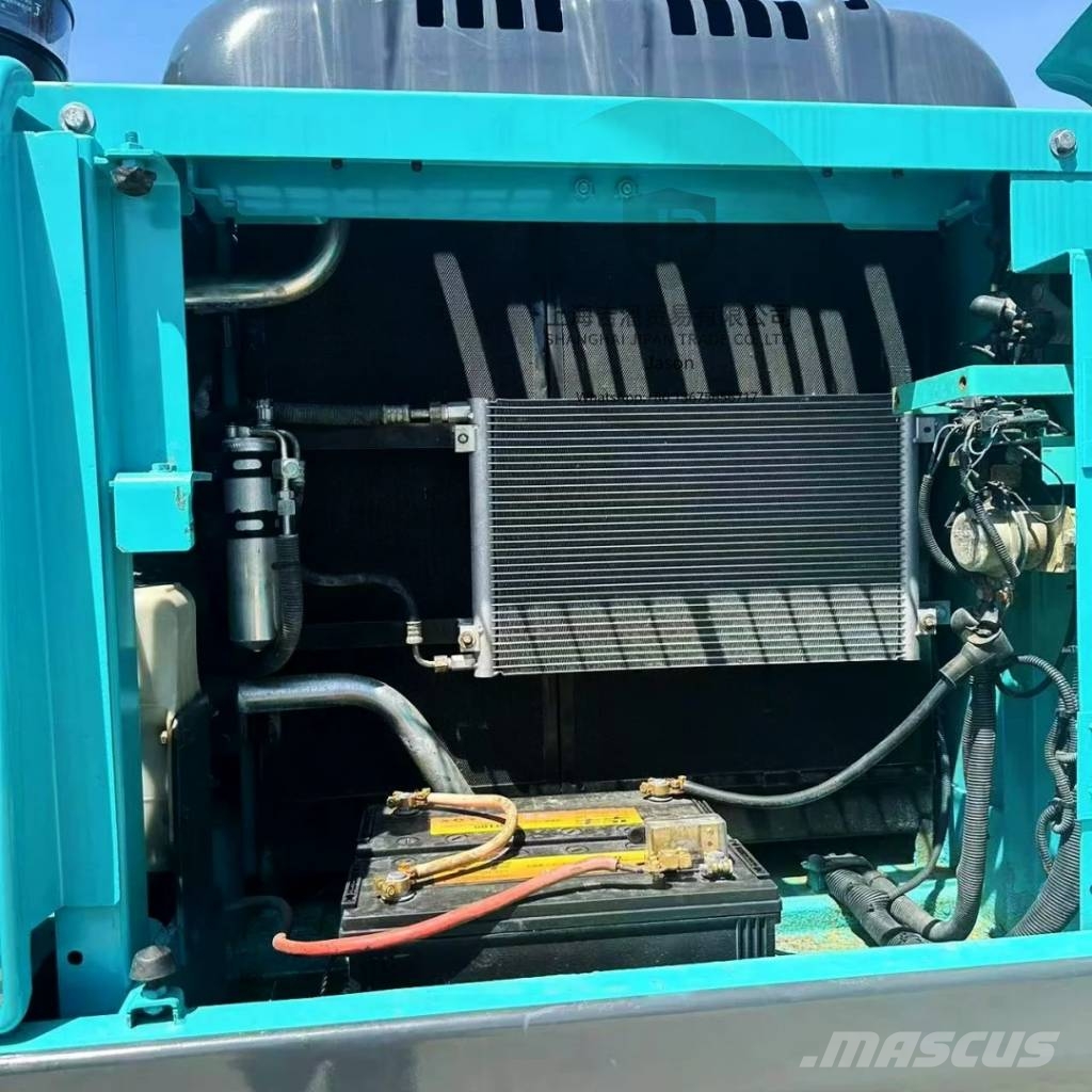 Kobelco SK 210 Гусеничні екскаватори