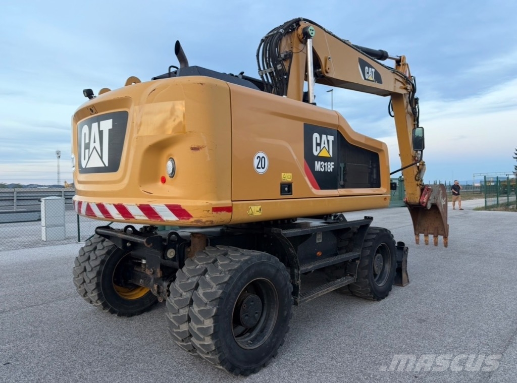CAT M 318 F Bagri na kolesih