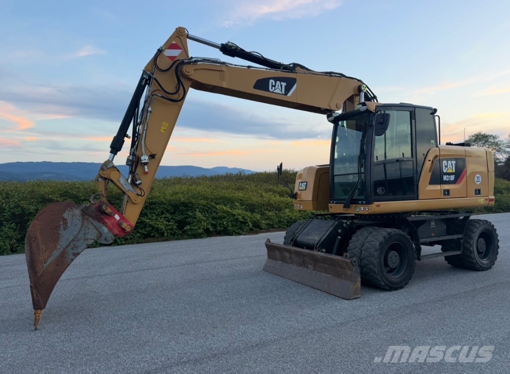 CAT M 318 F Bagri na kolesih