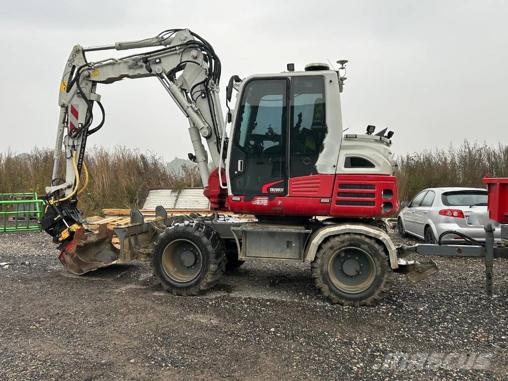 Takeuchi TB 295W med vogn Wielgraafmachines