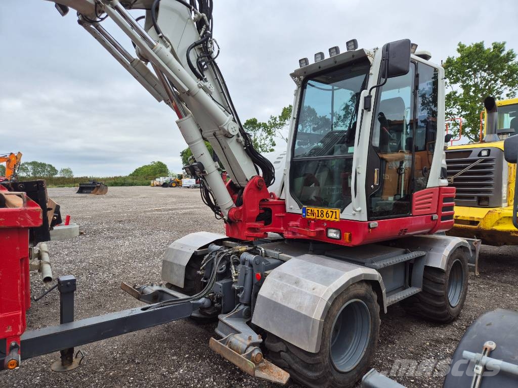 Takeuchi TB 295W med vogn Wielgraafmachines