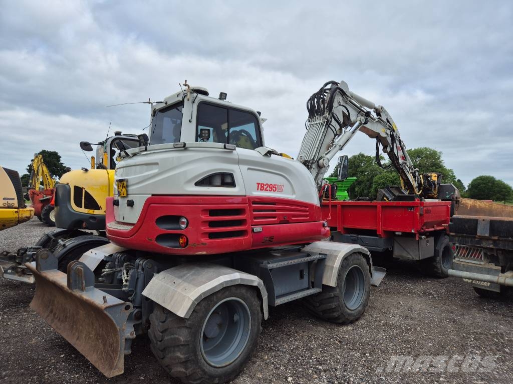 Takeuchi TB 295W med vogn Wielgraafmachines
