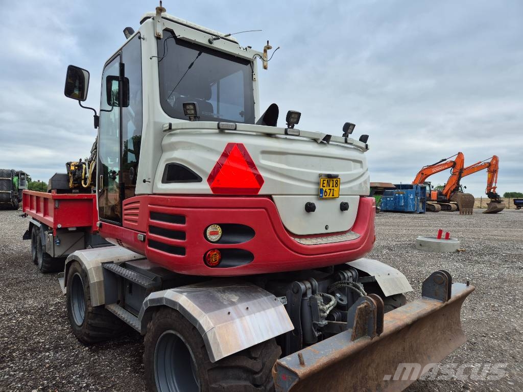 Takeuchi TB 295W med vogn Wielgraafmachines