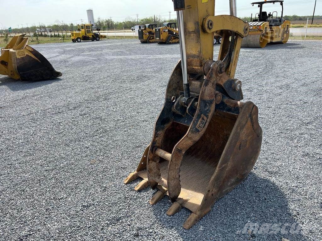 CAT 310 Гусеничні екскаватори