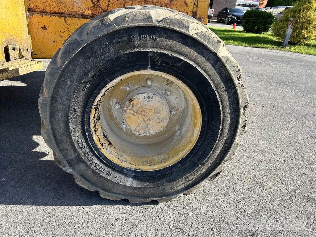 John Deere 510D لوادر ذات جرافات عكسية