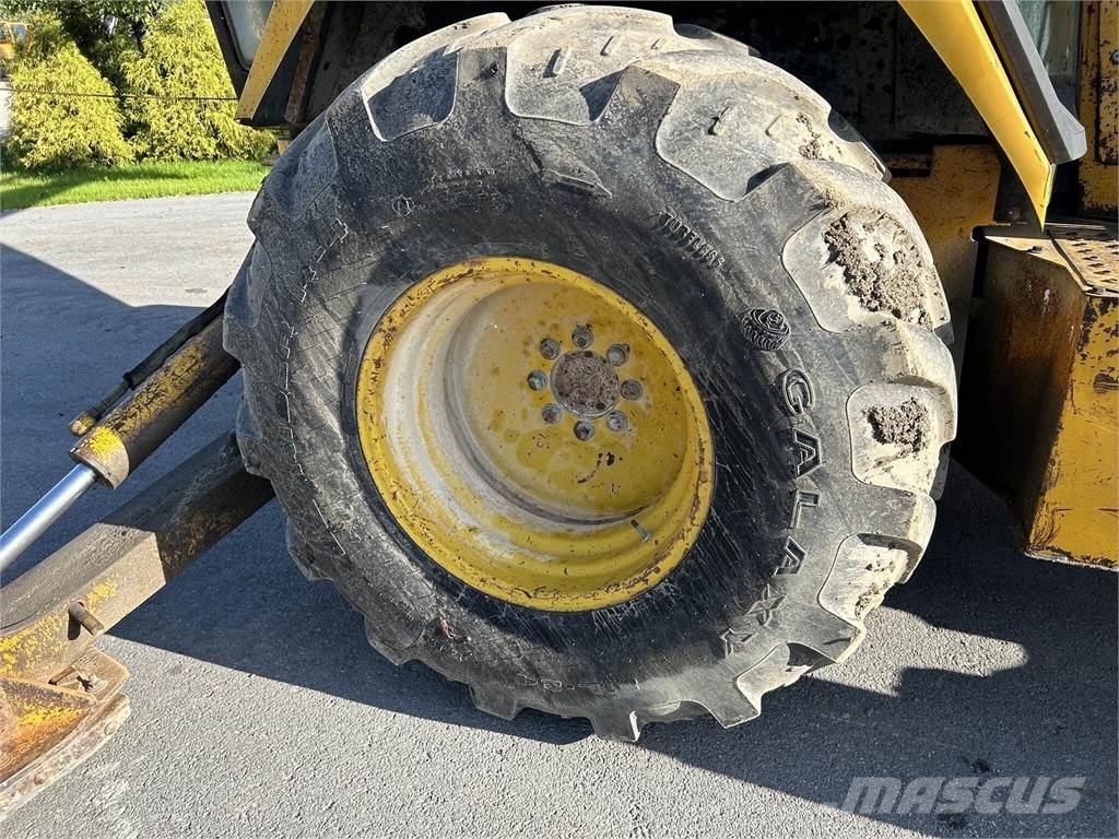 John Deere 510D لوادر ذات جرافات عكسية