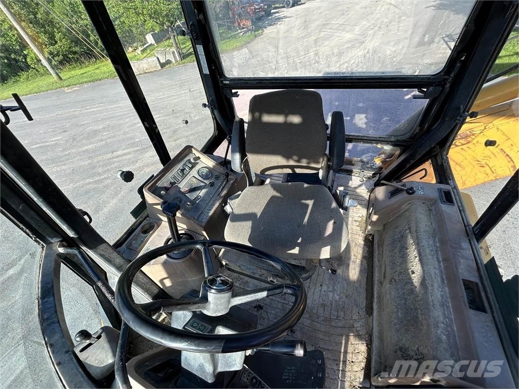 John Deere 510D لوادر ذات جرافات عكسية