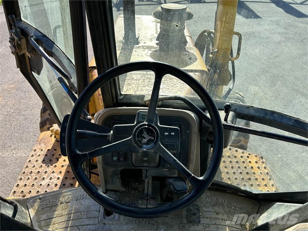 John Deere 510D لوادر ذات جرافات عكسية