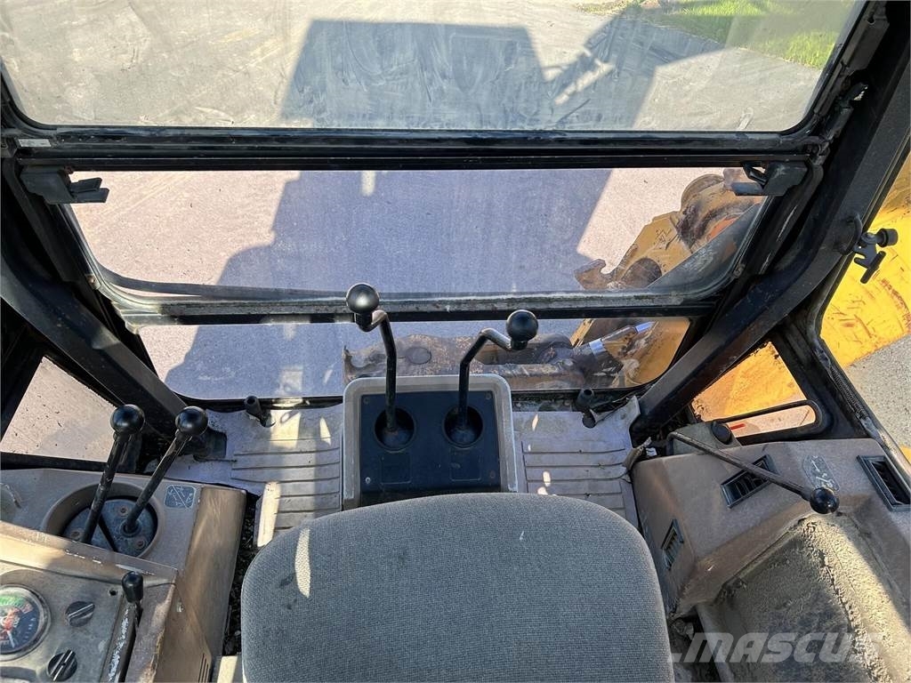 John Deere 510D لوادر ذات جرافات عكسية