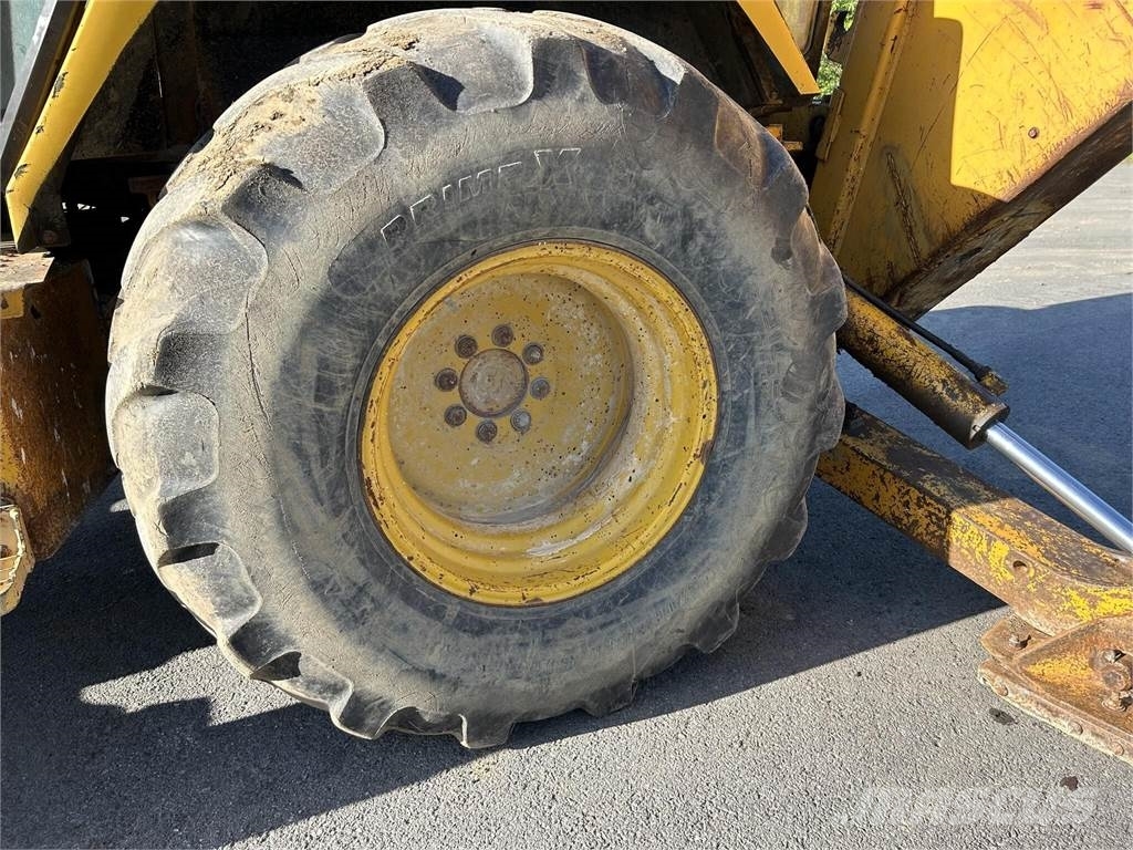 John Deere 510D لوادر ذات جرافات عكسية