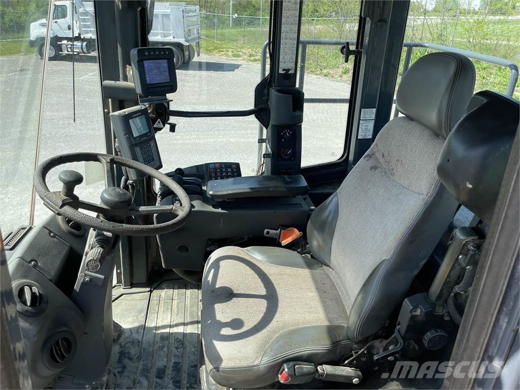 John Deere 844KIII Kolesové nakladače