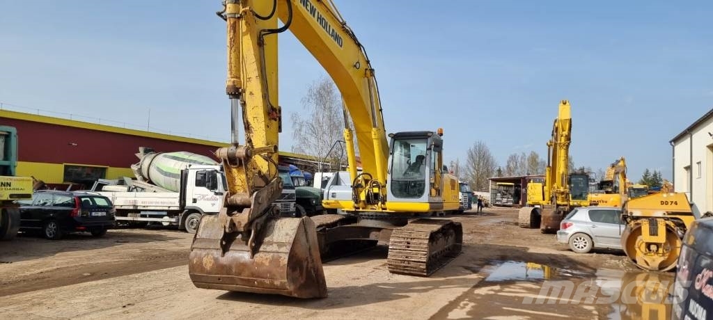 New Holland E 385 Raupenbagger