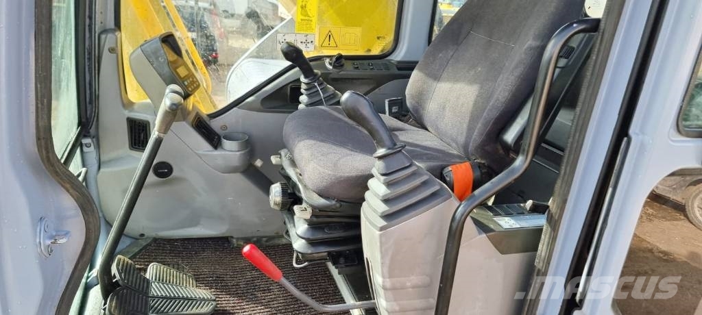 New Holland E 385 Raupenbagger