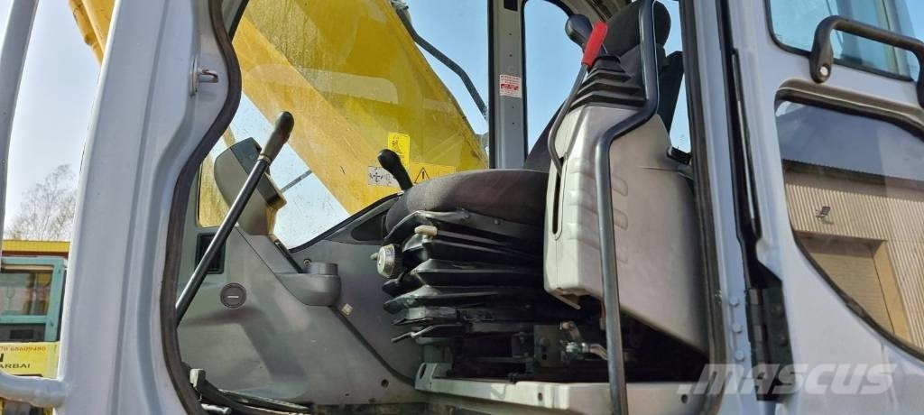 New Holland E 385 Raupenbagger