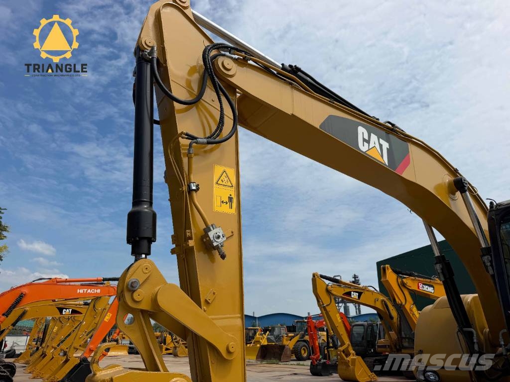 CAT M 320 轮式挖掘机