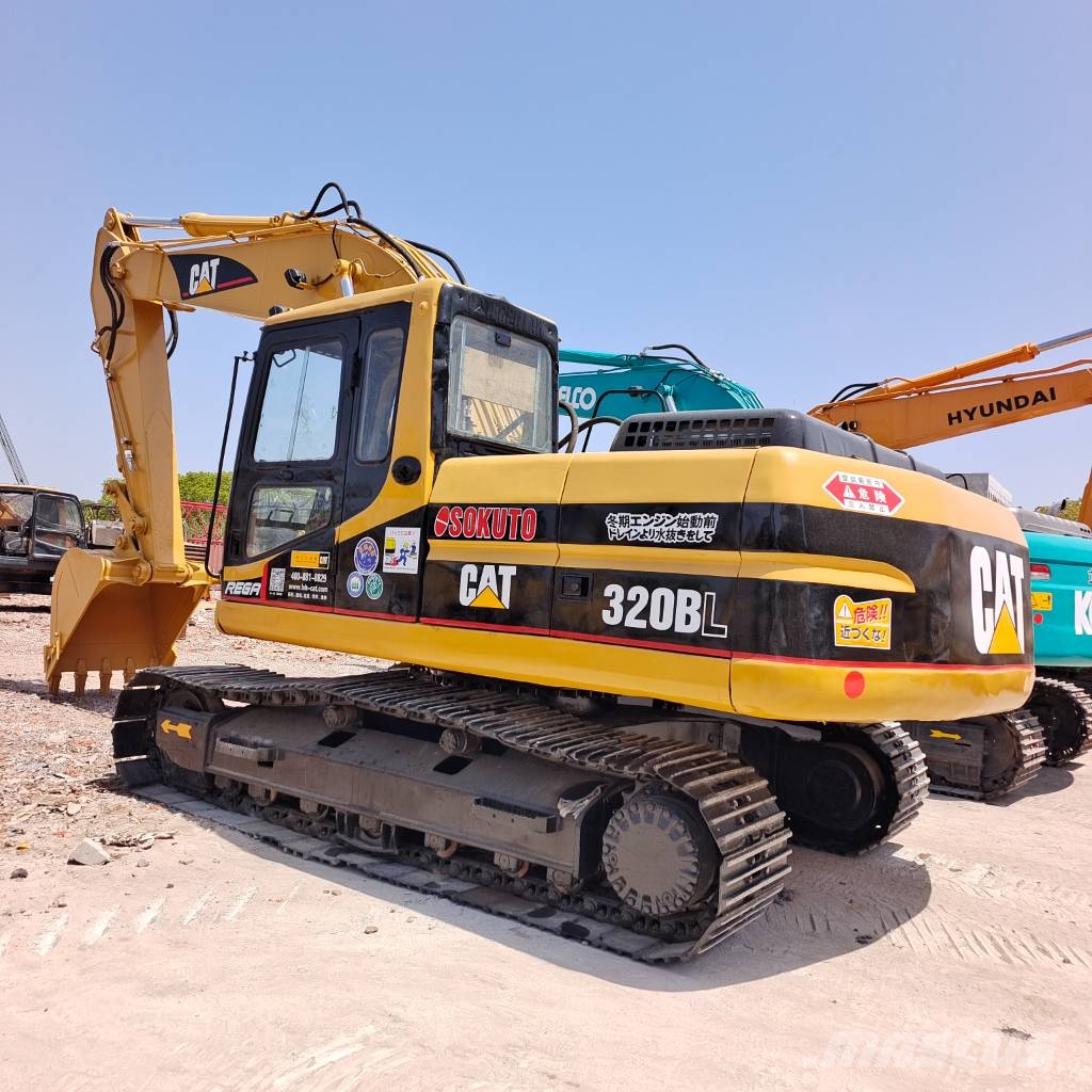 CAT 320 B L direct‑injection engine Bageri gusjeničari