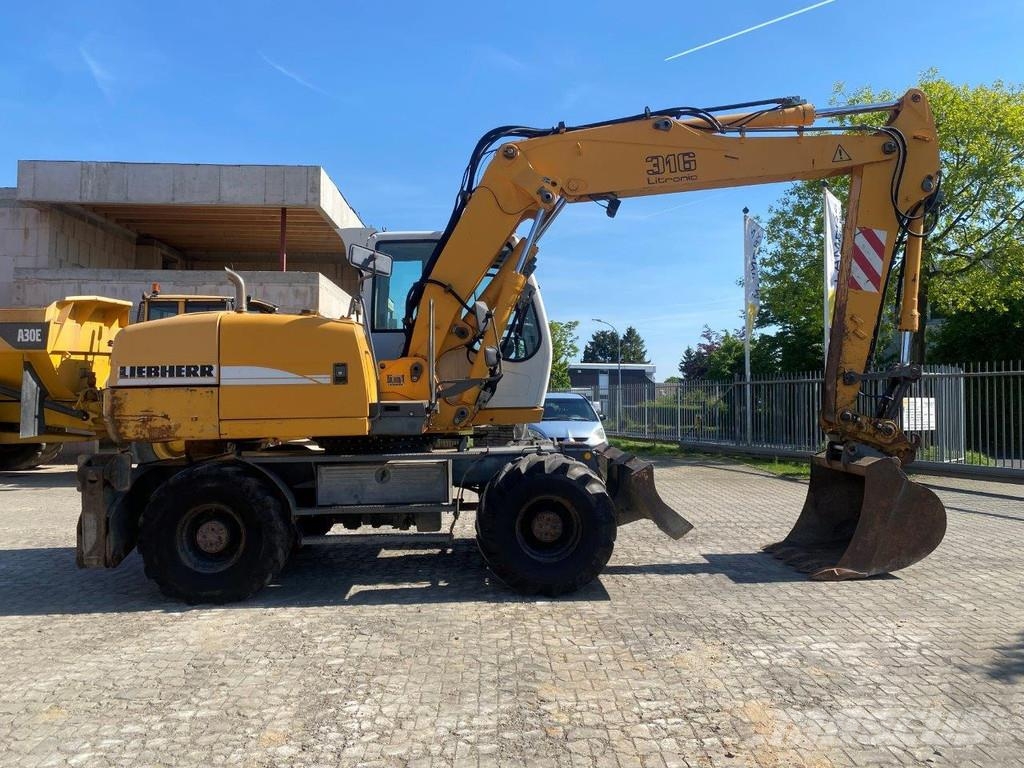 Liebherr A316 Litronic . Excavatoare cu roti