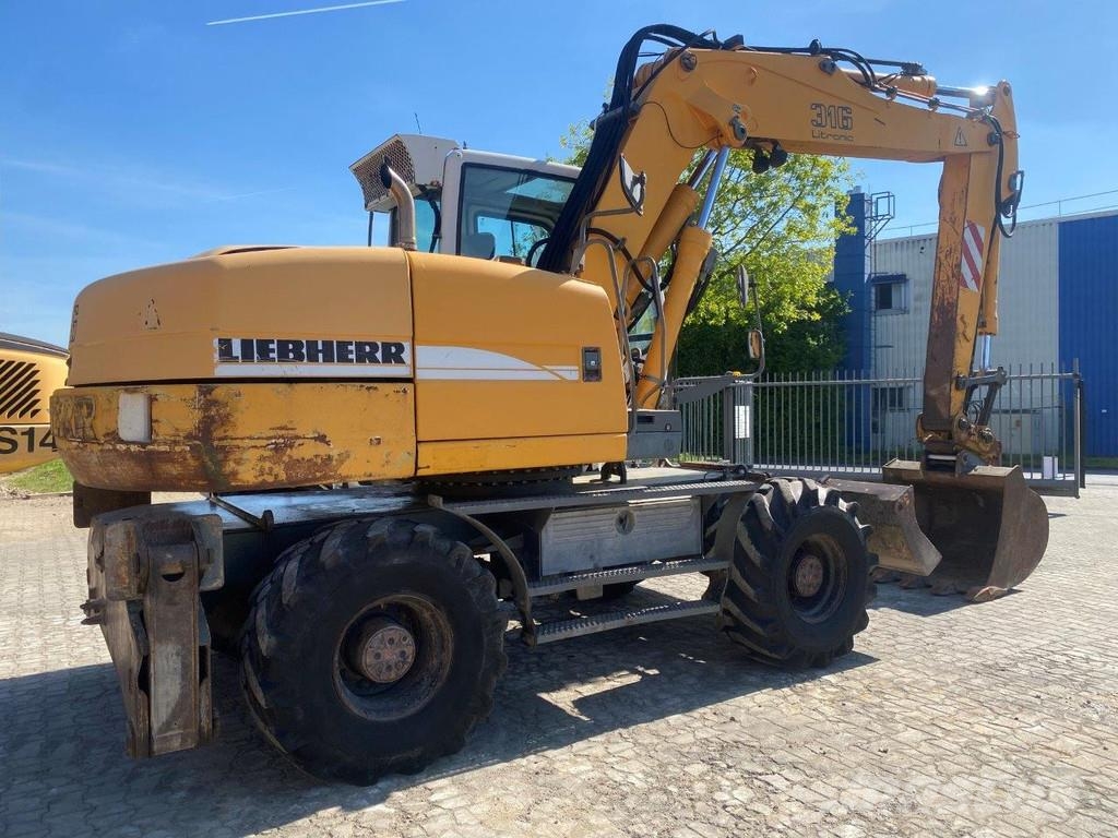 Liebherr A316 Litronic . Excavatoare cu roti