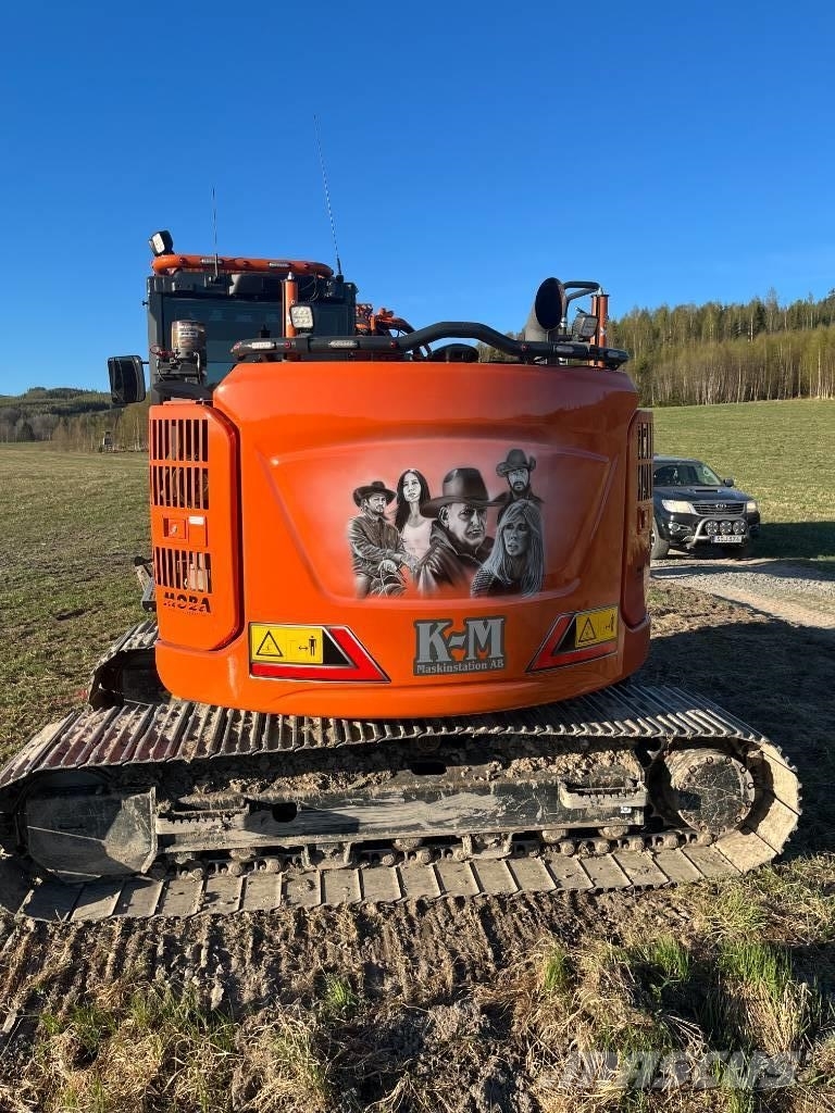 Hitachi ZX135US-7 حفارات زحافة