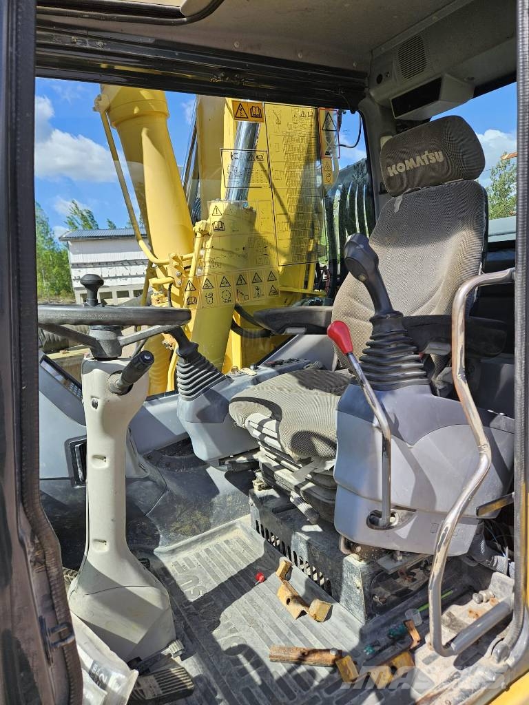 Sandvik DQ 240 ja Komatsu PW 180-7K Overfladeboreudstyr / Borerigge