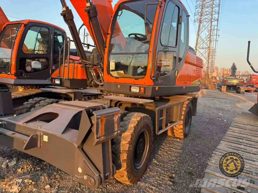 Develon DX210W Ratiniai ekskavatoriai