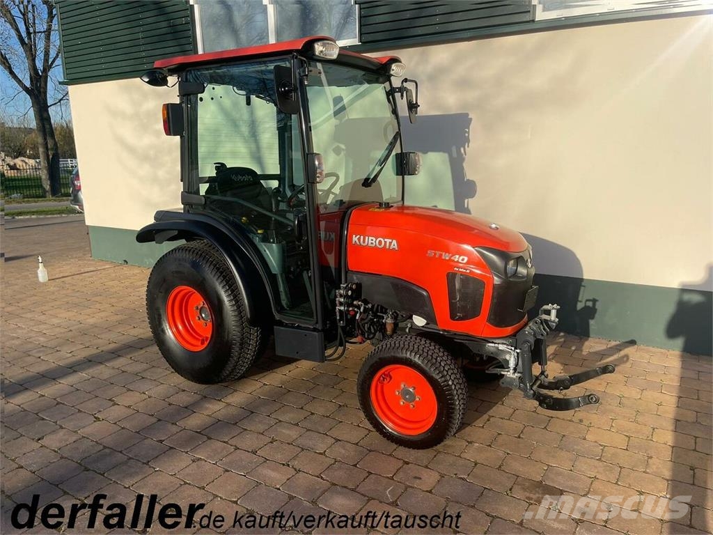 KUBOTA STW40 Allrad Schlepper und Bahnplaner... Tractors