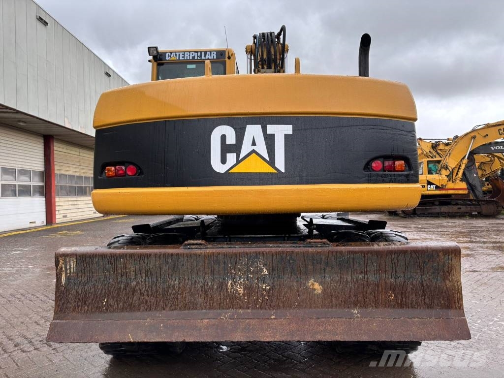 CAT M 313 C Excavadoras de ruedas
