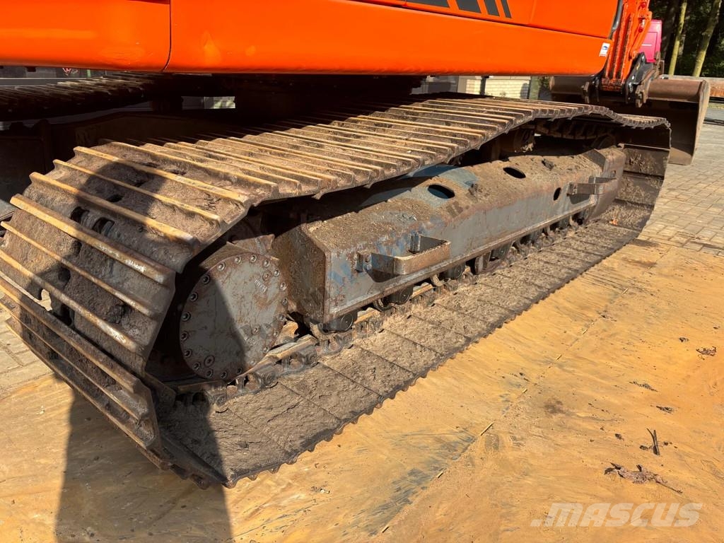 Doosan DX 140 LC Bagri goseničarji