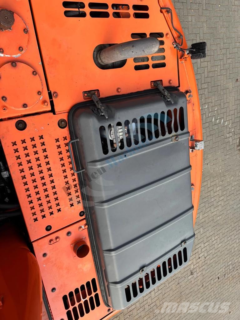 Doosan DX 140 LC Bagri goseničarji