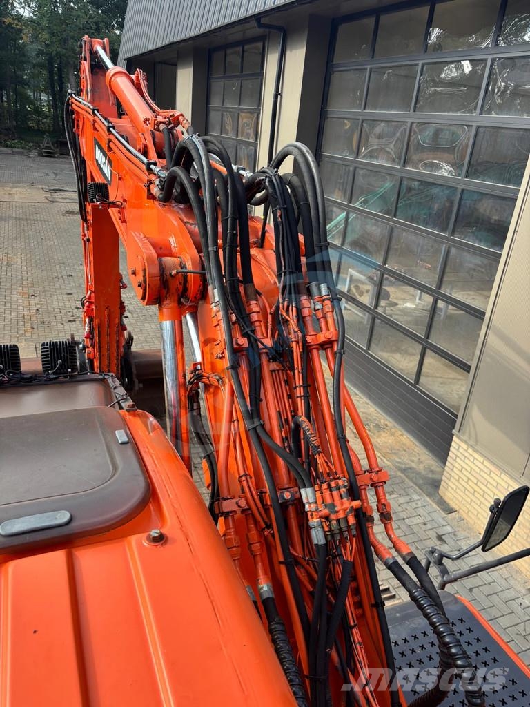 Doosan DX 140 LC Bagri goseničarji