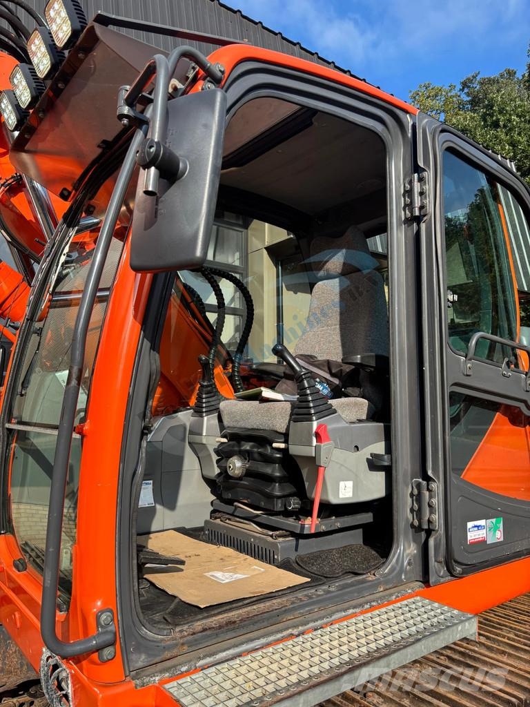 Doosan DX 140 LC Bagri goseničarji