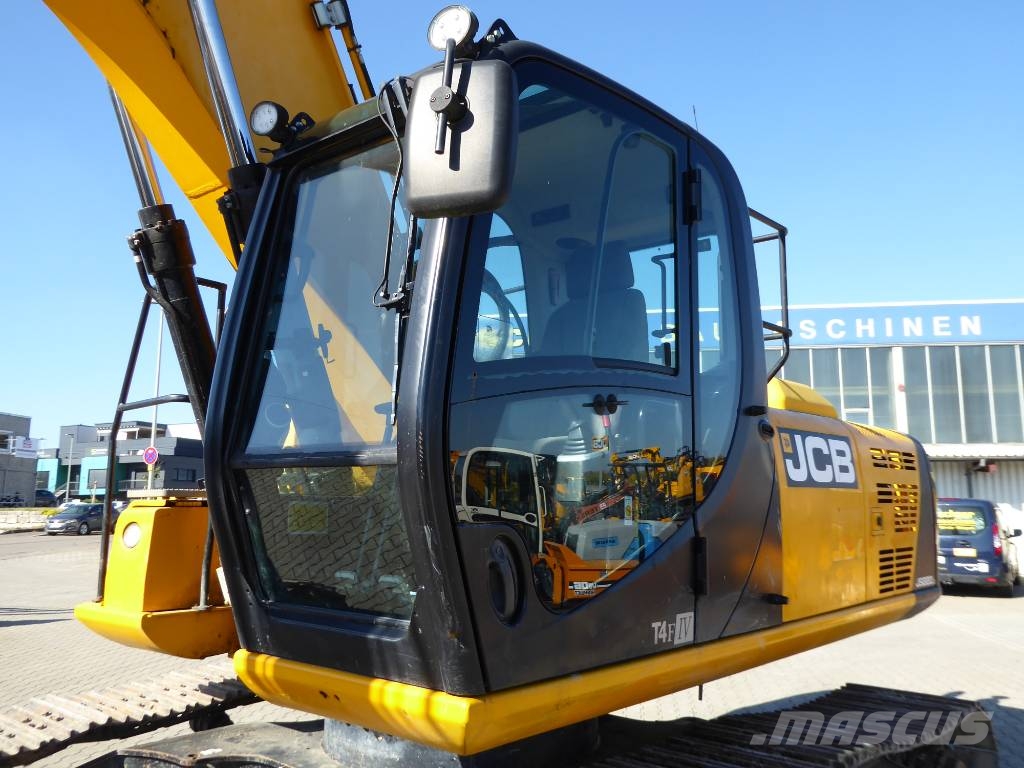JCB JS 220 N LC mit Oilquick OQ70/55 Raupenbagger