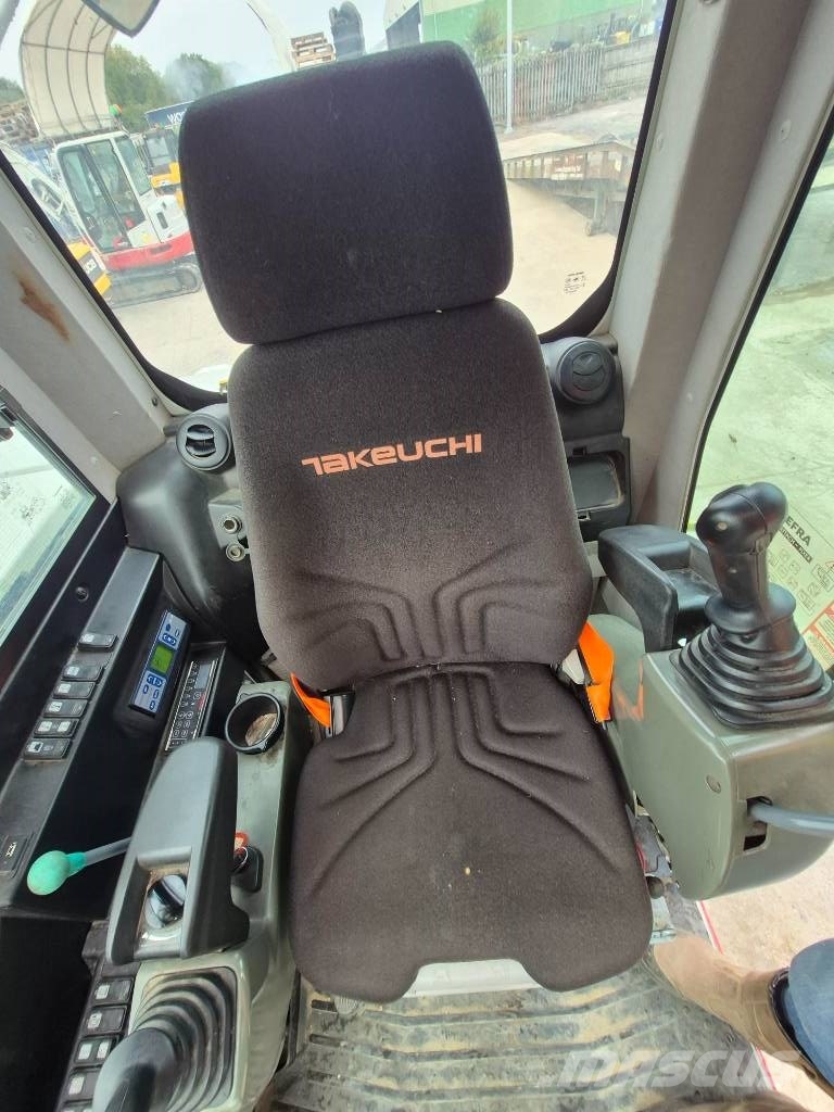 Takeuchi TB 295 W حفارات بعجل