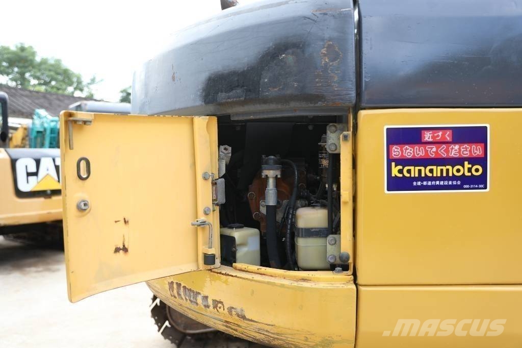 Komatsu PC 128 US Midi bagri 7t – 12t