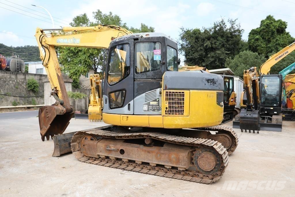 Komatsu PC 128 US Midi bagri 7t – 12t