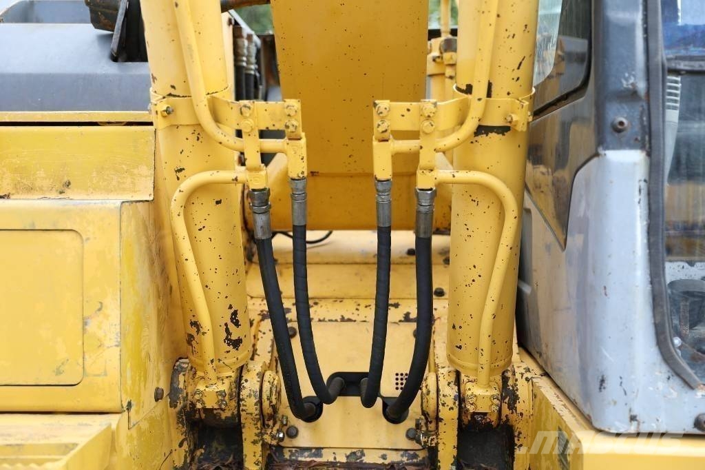 Komatsu PC 128 US Midi bagri 7t – 12t
