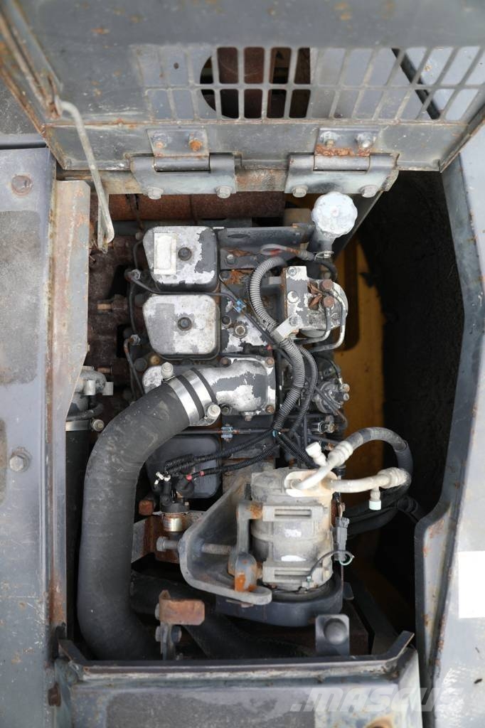 Komatsu PC 128 US Midi bagri 7t – 12t