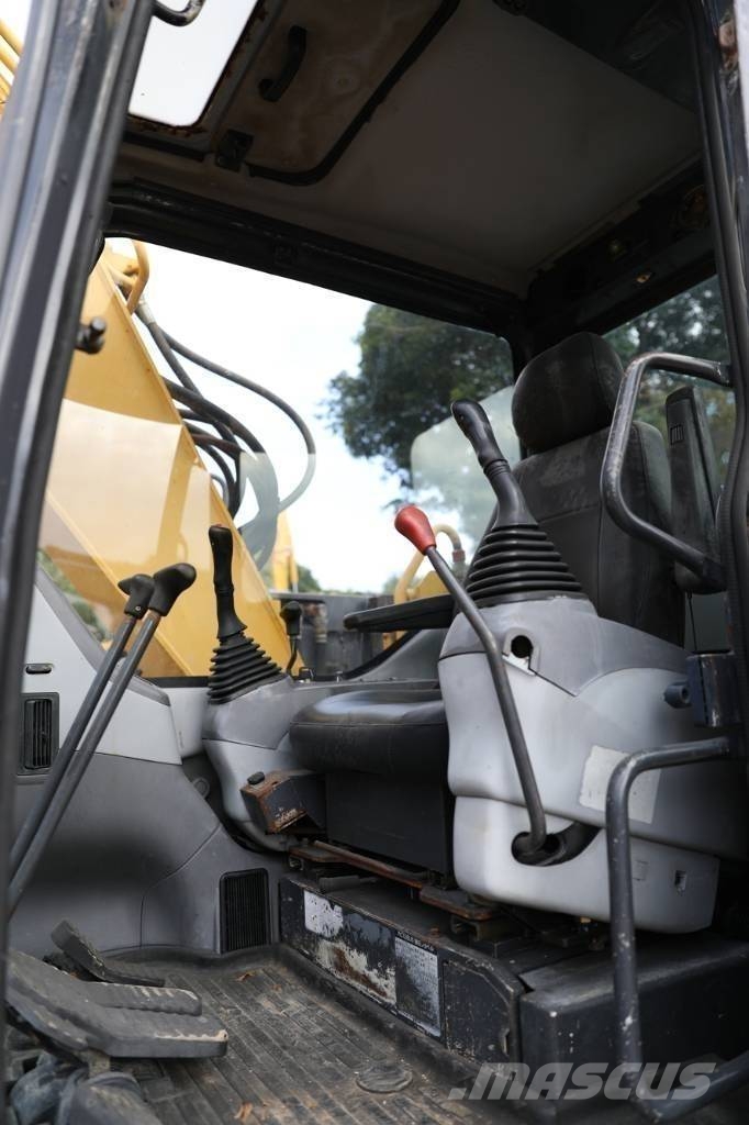 Komatsu PC 128 US Midi bagri 7t – 12t