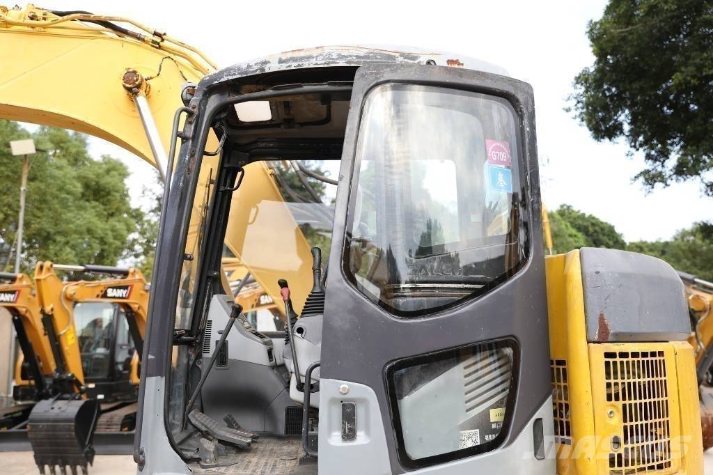 Komatsu PC 128 US Midi bagri 7t – 12t
