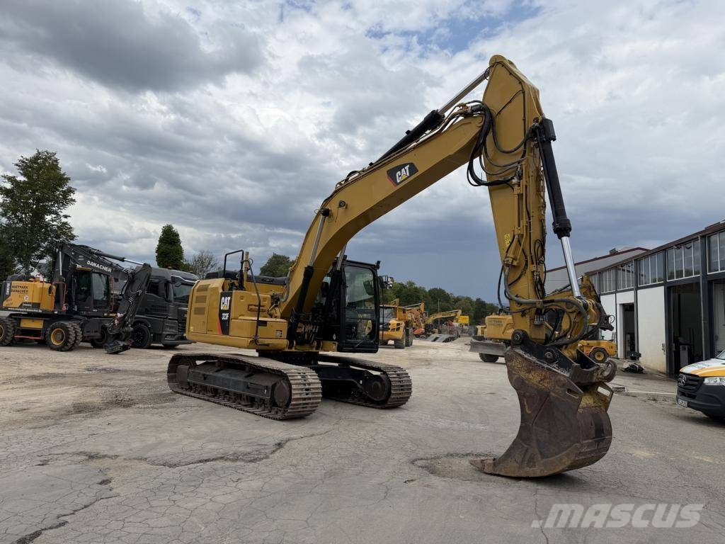 CAT 323 F L حفارات زحافة