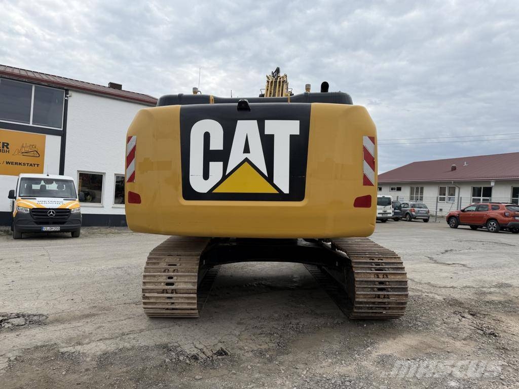 CAT 323 F L حفارات زحافة