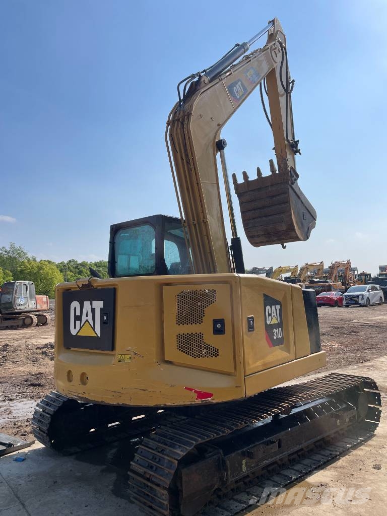 CAT 310 Rupsgraafmachines